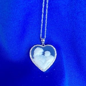 Heart necklace with beautiful sentiment on reverse “A Mother’s Love Is Forever”